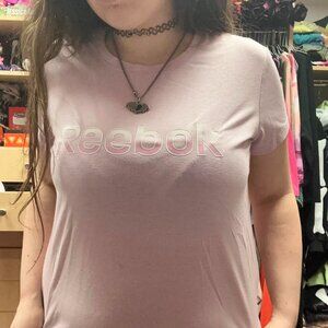 baby pink reebok slightly cropped shirt size medium!!